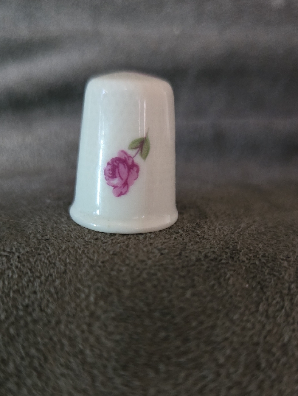 Vintage Limoges porcelain thimble made in France, featuring delicate flowers